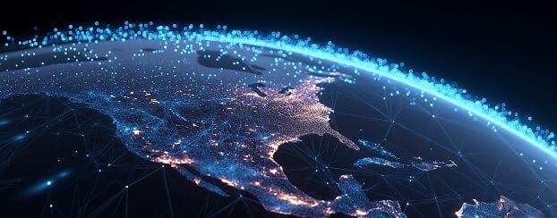 Satellite view of North America at night, illuminated with network-like lines and glowing blue dots representing digital connectivity across the continent.